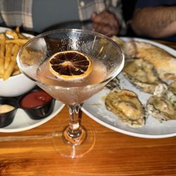 Blood orange cosmo, truffle fries & chargrilled oysters