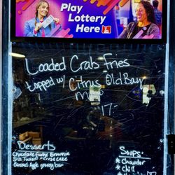 Upstairs Bar and Grill - Specials board