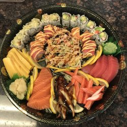 Ginger Asian Kitchen - PARTY TRAY with mars rolls , bobcat roll Christmas roll & Alaskan roll ,20 pieces of sushi with sweet egg, Kani , salmon ,eel & tuna.