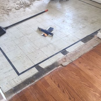 Empire Today - Original tile below the ceramic tile that the installers removed - Carpet Installation Near Me