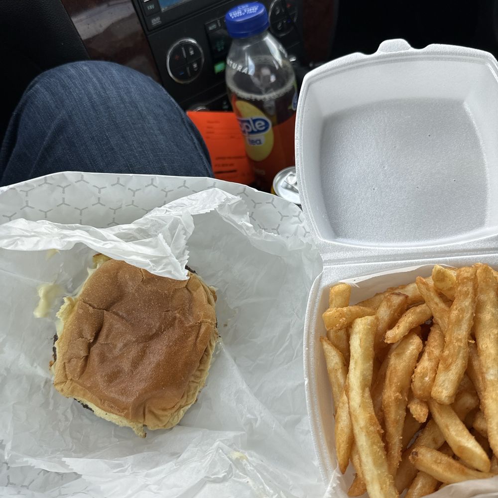 $18 worth of sad cheeseburger, gross battered fries and a yummy Snapple.