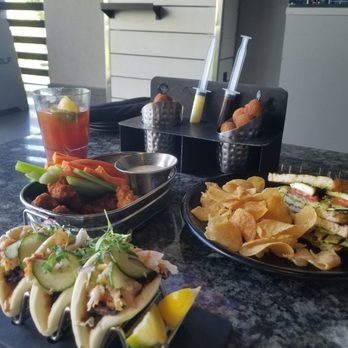 Topgolf - Kalbi "tacos" - buffalo wings - grilled zucchini caprese (delicious!) - donuts w/ chocolate & bavarian cream - bloody mary - Golf Near Me - Las Vegas, Nevada Topgolf - Kalbi "tacos" - buffalo wings - grilled zucchini caprese (delicious!) - donuts w/ chocolate & bavarian cream - bloody mary - Golf Near Me - Las Vegas, Nevada