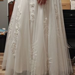 Alteration House - Dress is shorter in the back