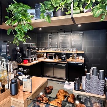 Kozy - Front counter with greenery and pastry--beautiful ambiance - Coffee & Tea Near Me - Goleta, California