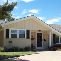 Lone Star Windows & Siding - Vertical Board N Batten Steel Siding, Double Pane Windows, and White Soffit & Fascia