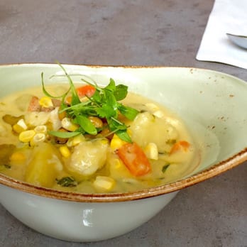 B Bistro + Bakery - Black Grouper Corn Bisque (crouton, olive oil powder, tropical delight flowers) - Bakeries Near Me - Miami, Florida B Bistro + Bakery - Black Grouper Corn Bisque (crouton, olive oil powder, tropical delight flowers) - Bakeries Near Me - Miami, Florida