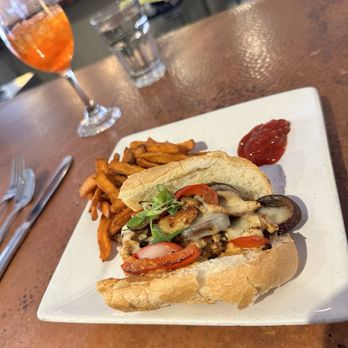 Bird - Our favorite lunch is the Blackened Chicken Philly halved with sweet potato fries. - American Near Me - Denver, Colorado