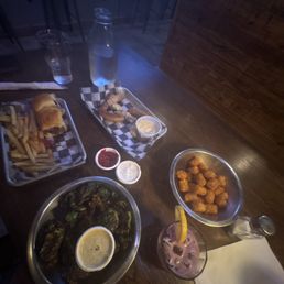 Pork sliders, beer pretzel with beer cheese, Brussels sprouts, tots, I'm yours huckleberry Pork sliders, beer pretzel with beer cheese, Brussels sprouts, tots, I'm yours huckleberry