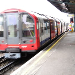 Greenford Underground Station - A West Ruislip service gathering speed...