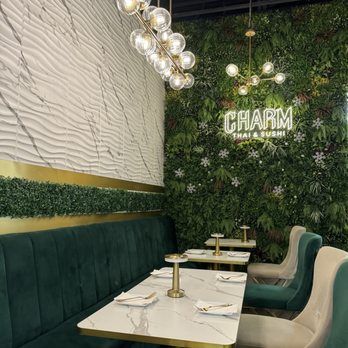 Charm Thai and Sushi - Back sitting area with restaurant accent wall - Thai Near Me - Windermere, Florida Charm Thai and Sushi - Back sitting area with restaurant accent wall - Thai Near Me - Windermere, Florida