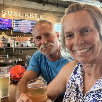 Suncreek Brewery - Happy couple - Brewpubs Near Me - Clermont, Florida Suncreek Brewery - Happy couple - Brewpubs Near Me - Clermont, Florida
