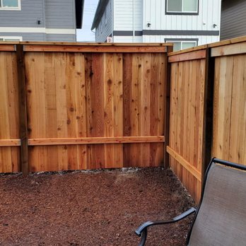 NW Elite Construction - 6 ft picture frame lining the back yard - General Contractors Near Me