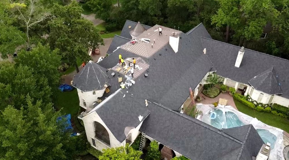 Slide of Bone Dry Roofing and Restoration