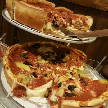 Giordano's - One with tons of meat and the other with tons of veggies. So good!!!! - Italian Near Me - Orlando, Florida
