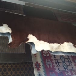 We have a wide range of rugs we are able to work on; from antique oriental, to wall to wall, to even cow hide.