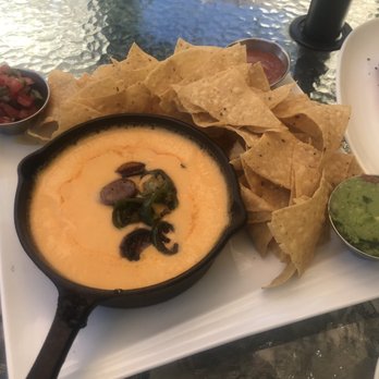 Stellers Jay Cafe - Queso, crispy chips, pico, guacamole and salsa - Tapas Bars Near Me - Blairsden, California