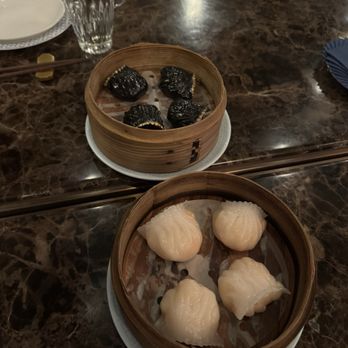 Mott 32 - King prawn har gow in foreground. Miso black cod dumpling in the background - Chinese Near Me - Toronto, Ontario