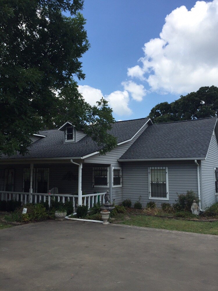 Slide of Tiger Roofing