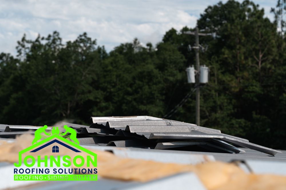 Slide of Johnson Roofing Solutions