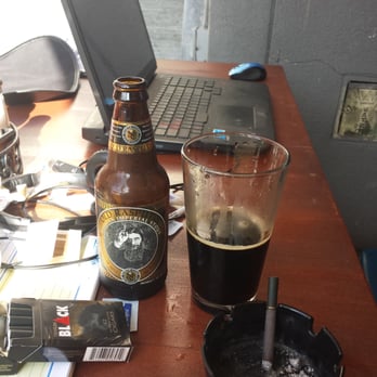 Barney's Beanery - Everything I consume is dark brown or black today: (Djarum Blacks, Rasputin Stout, ashtray, & computer. - Breakfast & Brunch Near Me - Burbank, California