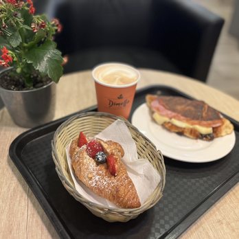 Granier Bakery - Toasted bacon and Brie sandwich, latte and berry custard croissant. - Bakeries Near Me - London, XGL Granier Bakery - Toasted bacon and Brie sandwich, latte and berry custard croissant. - Bakeries Near Me - London, XGL