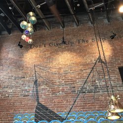 Merchant Oyster Company - Cool Save the ship decor and light.