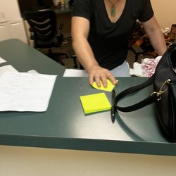 Town Massage  - She's trying to write on a sticky note how much I should be tipping her and that 15 percent wasn't enough