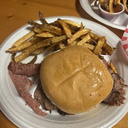 Sliced beef brisket and hit link sandwich & Fries