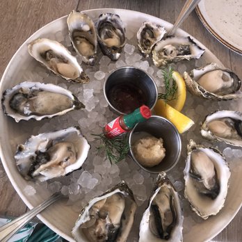 Driftwood Kitchen - Dozen oysters... the server didn't explain what came from where though - Seafood Near Me - Laguna Beach, California