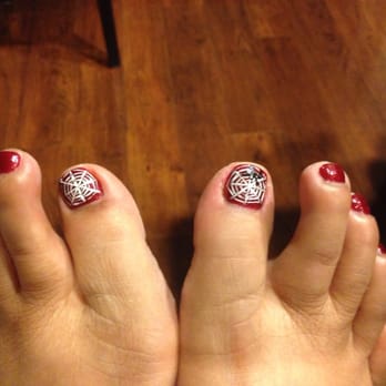 Jo Nails 2 - Candy apply red with sparkle nail polish. Spider web in white and silver. Right big toe added a spider... Too cute!!! - Nail Salons Near Me - Manteca, California