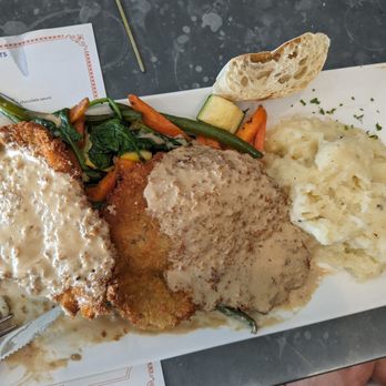 Bistro St Germain - Pork schnitzel -Delicious - French Near Me - Seal Beach, California Bistro St Germain - Pork schnitzel -Delicious - French Near Me - Seal Beach, California