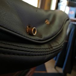 Artistic Upholstery - Chair side #2 showing screw in plate on chair back