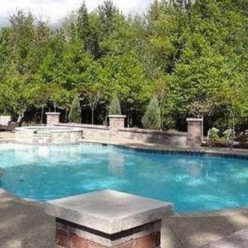 The Brick Paver Dr - Brick paver patio pool surround - Landscaping Near Me - Dryden, Michigan The Brick Paver Dr - Brick paver patio pool surround - Landscaping Near Me - Dryden, Michigan