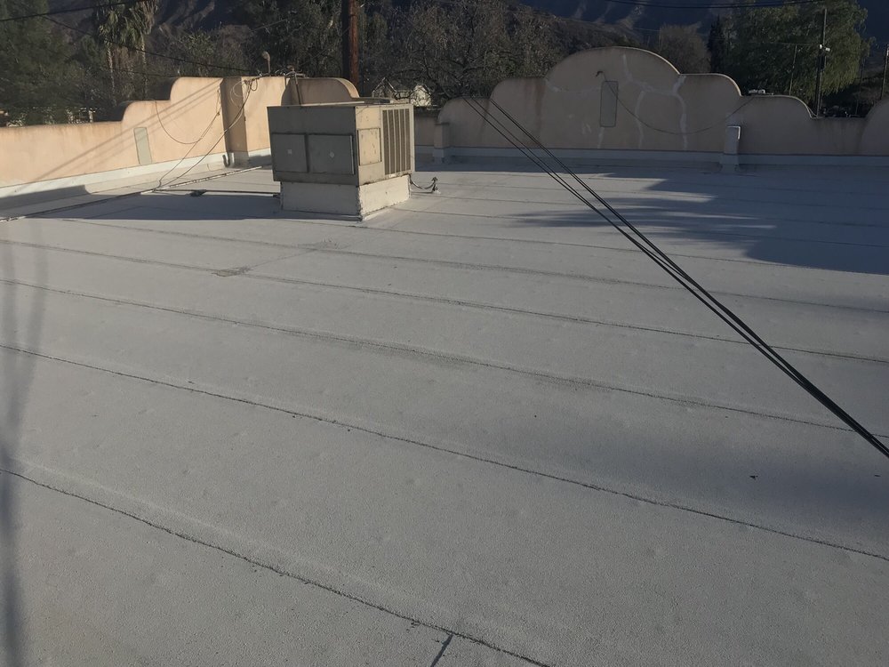 Slide of Aztec Roofing