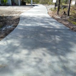 Hester Concrete Service - Residential Driveway Pour. We have a long driveway with a huge patio and walkway.  What are you waiting for.