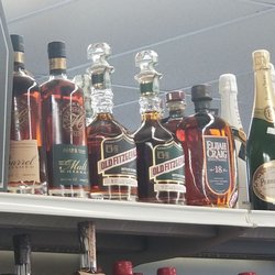 Louie's Liquor & Fine Wine - Way above retail and probably collecting dust