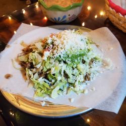 Las Comadres Taqueria Y Mariscos - Bean tostada w/ carnitas, as an additional topping