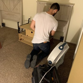 EV Charging Solutions - Ed assembling the twin bed headboards - Electricians Near Me EV Charging Solutions - Ed assembling the twin bed headboards - Electricians Near Me