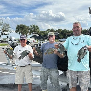 M&S Crappie Guides - Captain Mike with M&S Crappie Guides and some happy anglers showing some crappies that they caught fishing in Farm 13, in Fellsmere, Fl. - Fishing Near Me M&S Crappie Guides - Captain Mike with M&S Crappie Guides and some happy anglers showing some crappies that they caught fishing in Farm 13, in Fellsmere, Fl. - Fishing Near Me