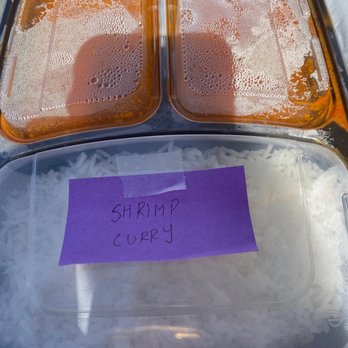 Slide On Over L A - a plastic container with rice and a sticky note - Specialty Food Near Me Slide On Over L A - a plastic container with rice and a sticky note - Specialty Food Near Me
