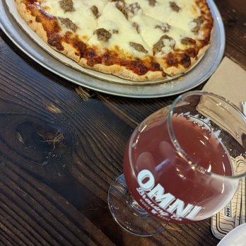 OMNI Brewery & Taproom - Sausage pizza and smoothie sour - Breweries Near Me - Maple Grove, Minnesota