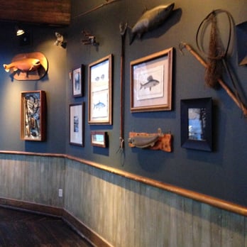 River Café - Fishing Artifacts on the wall - Canadian (New) Near Me - Calgary, Alberta