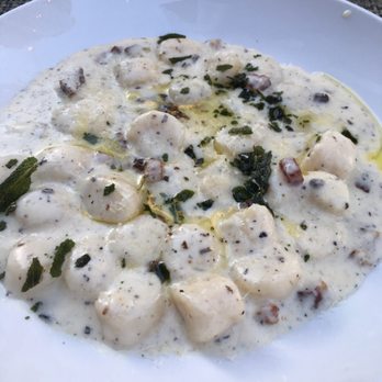 Siena Tavern - Gnocchi with cream sauce and pancetta - Italian Near Me - Chicago, Illinois Siena Tavern - Gnocchi with cream sauce and pancetta - Italian Near Me - Chicago, Illinois