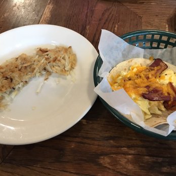 Schilo's - Egg, bacon and cheese taco with a side of hash browns - Delis Near Me - San Antonio, Texas Schilo's - Egg, bacon and cheese taco with a side of hash browns - Delis Near Me - San Antonio, Texas