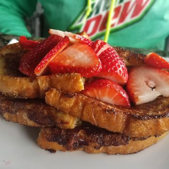 Topgolf - Creme brulee French toast with fresh strawberries - Golf Near Me - Roseville, California Topgolf - Creme brulee French toast with fresh strawberries - Golf Near Me - Roseville, California
