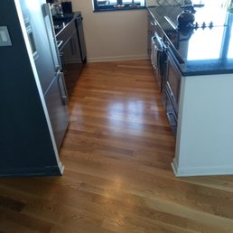 Repaired and refinished kitchen floor.