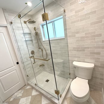 King Construction Management - a bathroom with a shower and toilet - Painters Near Me - Miami, Florida