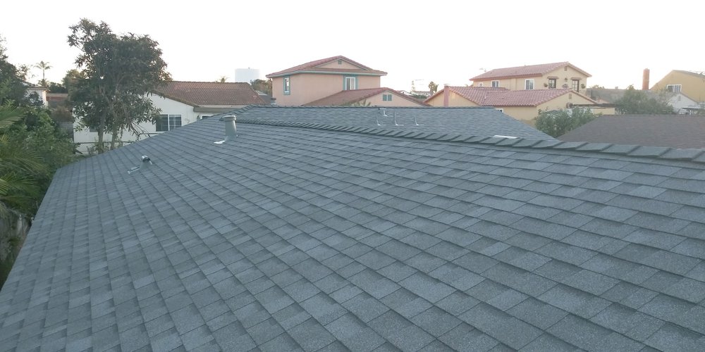 Slide of Dennis Cook Roofing