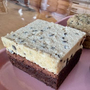 Fluff Bake Bar - Booty call brownie-- topped with chocolate chip cookie dough. The cookie dough tasted like a frosting, so good! - Bakeries Near Me - Houston, Texas Fluff Bake Bar - Booty call brownie-- topped with chocolate chip cookie dough. The cookie dough tasted like a frosting, so good! - Bakeries Near Me - Houston, Texas