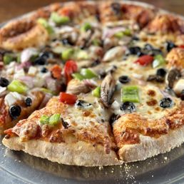 Devil's Garden pizza - mushroom, red onion, olives, green pepper Devil's Garden pizza - mushroom, red onion, olives, green pepper